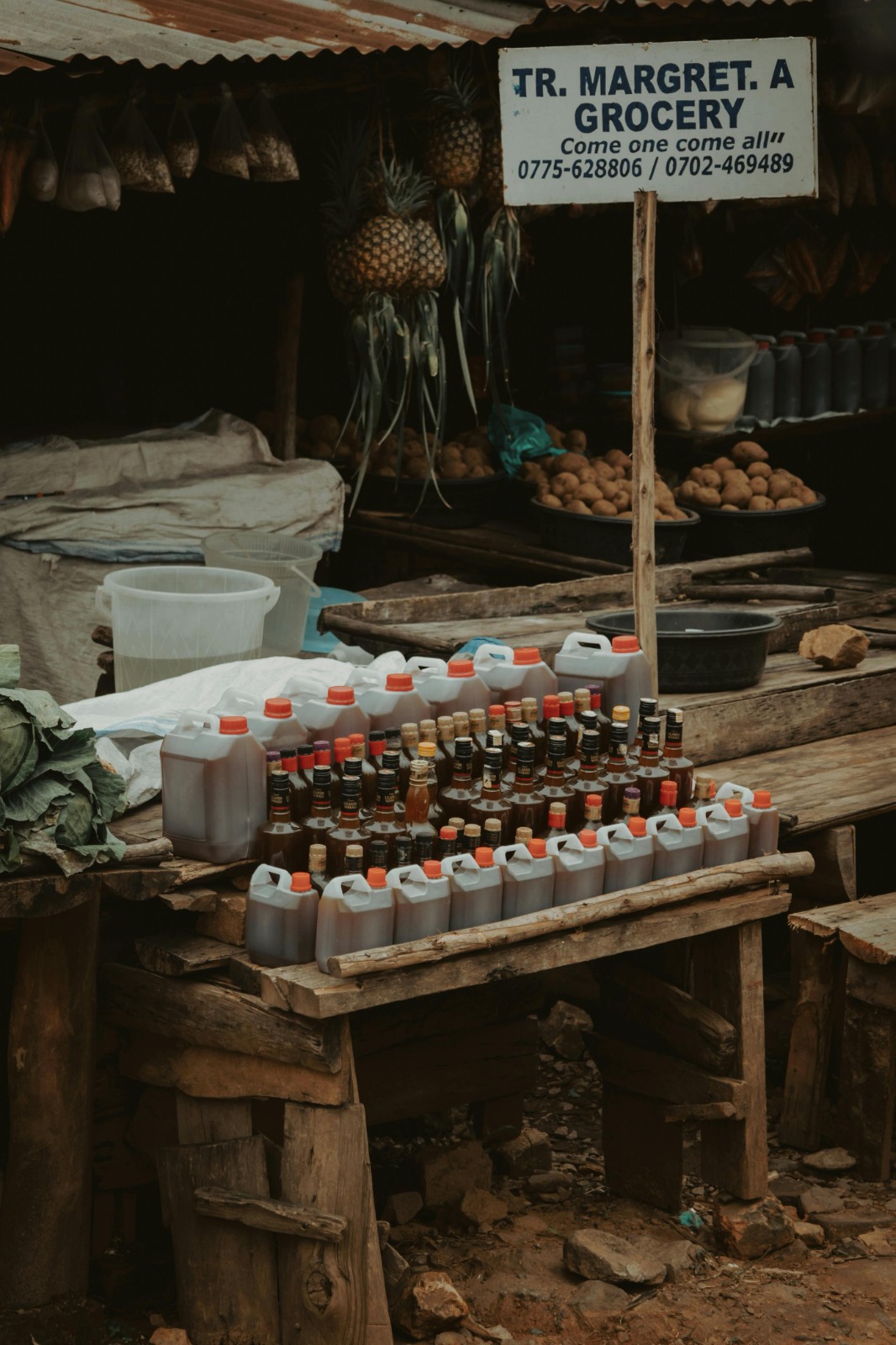 African market stall with goods and shoppers